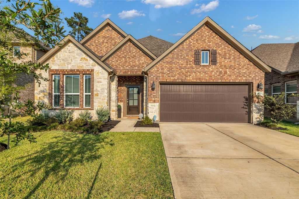 Photo of 1936 Canyon Live Oak Street, Conroe, TX 77304 (MLS # 94009792)