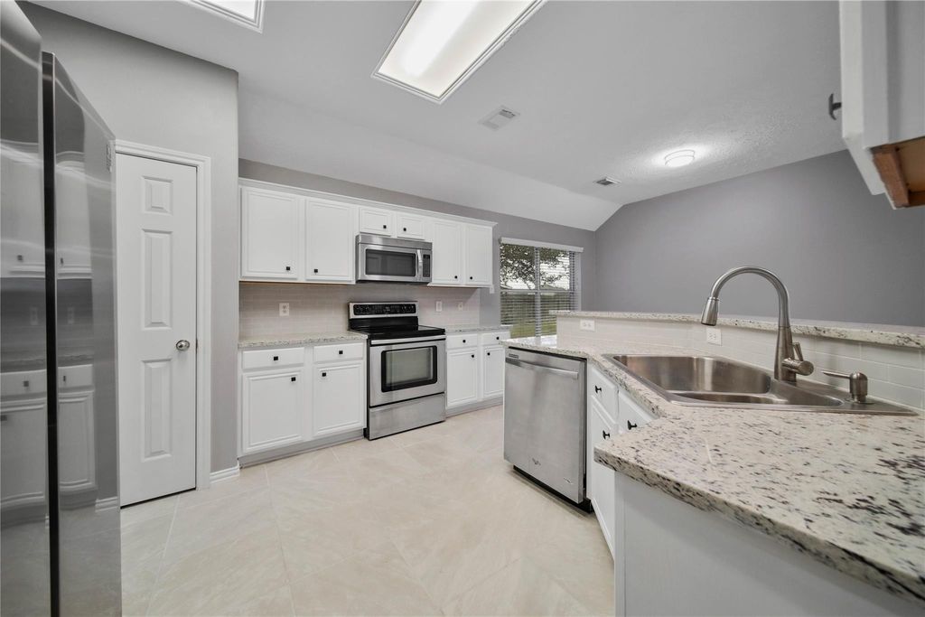 Photo of 22028 Knights Cove Drive, Kingwood, TX 77339 (MLS # 73188295)