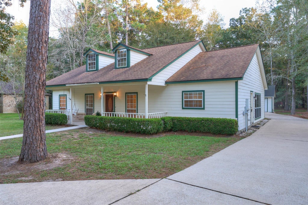 Photo of 12 Timber Lane, Conroe, TX 77384 (MLS # 72447996)