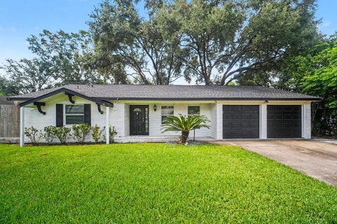 Photo of 9327 Meadowbriar Lane, Houston, TX 77063 (MLS # 24597222)