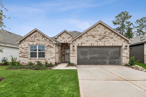 Photo of 973 Garden Path Drive, Willis, TX 77378 (MLS # 91038265)