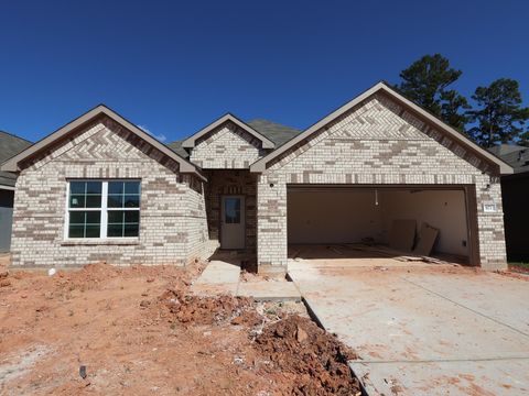 Photo of 973 Garden Path Drive, Willis, TX 77378 (MLS # 91038265)