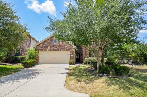 Photo of 35 S Marshside Place, Spring, TX 77389 (MLS # 68922361)