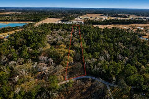 Photo of 17038 Payne Rd Rd, Conroe, TX 77302 (MLS # 64413402)