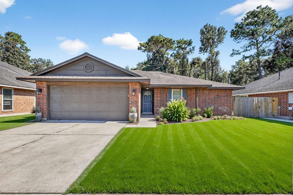 Photo of 2215 Friarwood Trail, Kingwood, TX 77339 (MLS # 93244038)