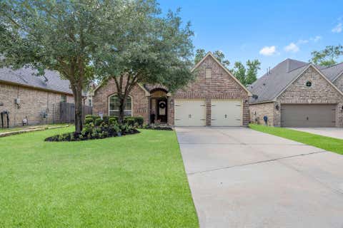 Photo of 239 Forest Peak Way, Montgomery, TX 77316 (MLS # 36806435)