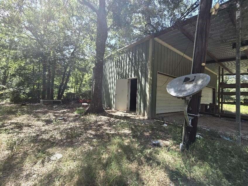 Photo of 442 County Road 356, New Caney, TX 77357 (MLS # 50308417)