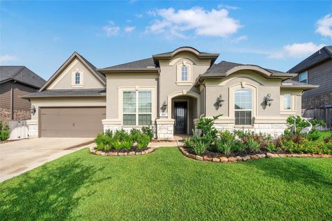 Photo of 915 Falcon Hollow Lane, Pinehurst, TX 77362 (MLS # 14033410)
