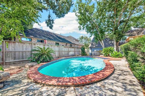 Photo of 418 N Wilcrest Drive, Houston, TX 77079 (MLS # 83224075)