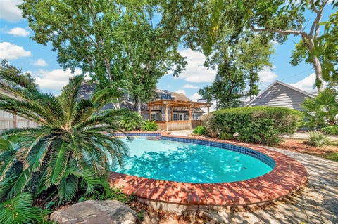 Photo of 418 N Wilcrest Drive, Houston, TX 77079 (MLS # 83224075)