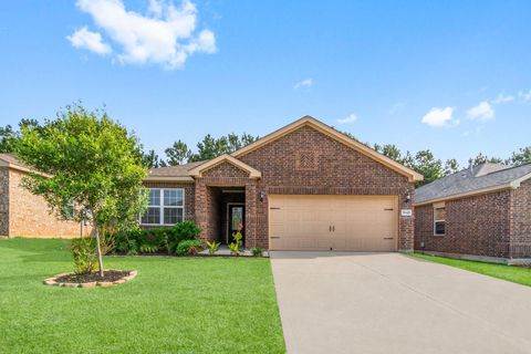 Photo of 7643 Glaber Leaf Road, Conroe, TX 77304 (MLS # 7674309)