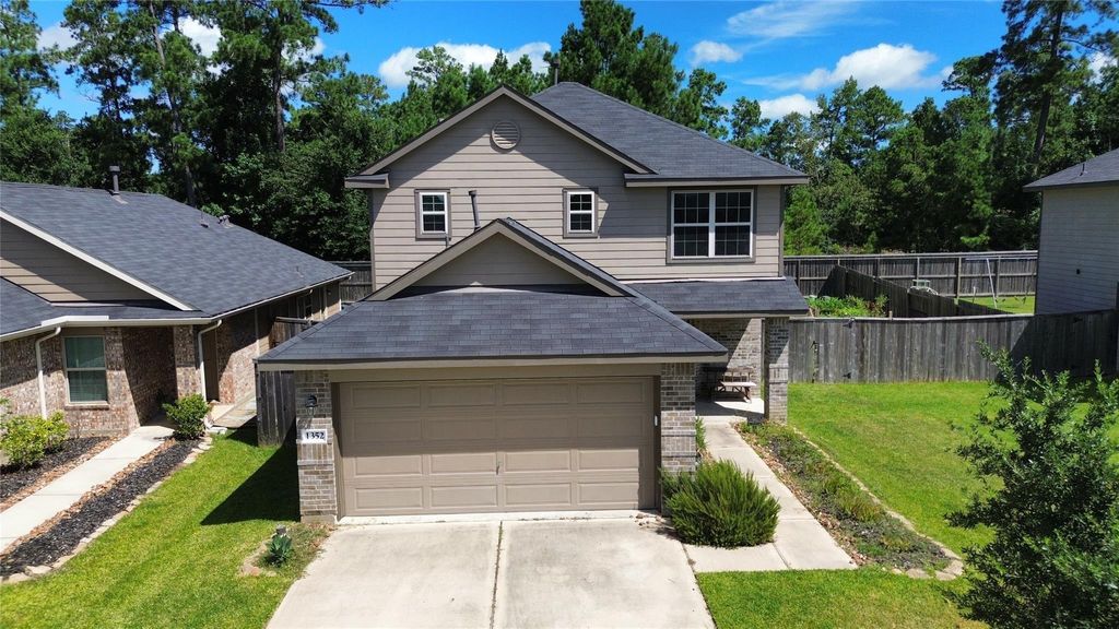 Photo of 1352 Winding Willow Drive, Pinehurst, TX 77362 (MLS # 75730659)