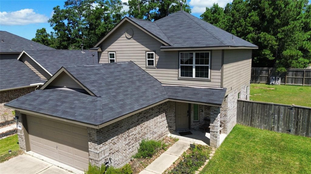 Photo of 1352 Winding Willow Drive, Pinehurst, TX 77362 (MLS # 75730659)