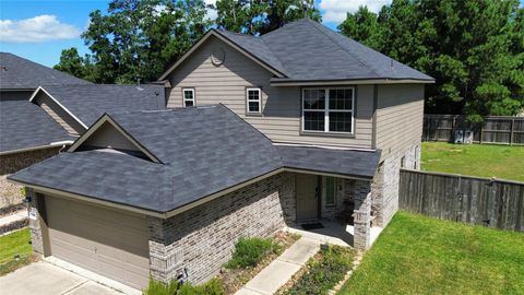 Photo of 1352 Winding Willow Drive, Pinehurst, TX 77362 (MLS # 75730659)