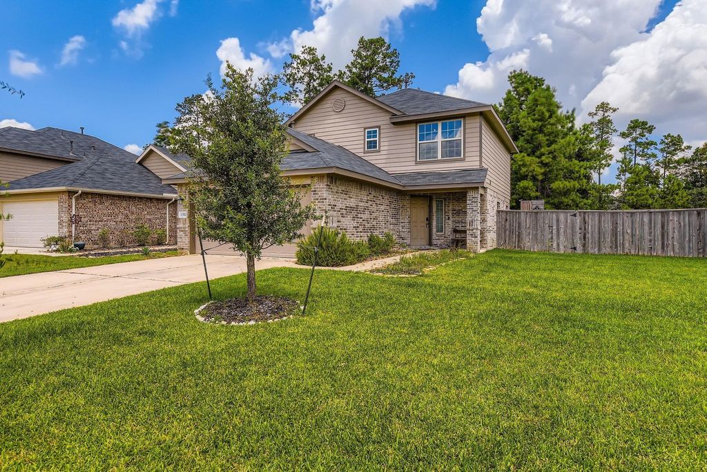 Photo of 1352 Winding Willow Drive, Pinehurst, TX 77362 (MLS # 75730659)