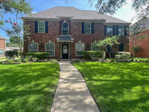 Photo of 7202 Starbridge Drive, Houston, TX 77095 (MLS # 18825983)