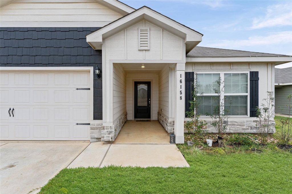 Photo of 16158 Sugar Falls Drive, Conroe, TX 77303 (MLS # 78831714)