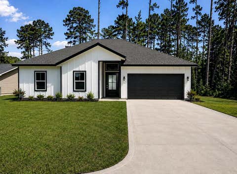 Photo of 15506 Arrowhead Loop W Loop, Willis, TX 77378 (MLS # 20134868)