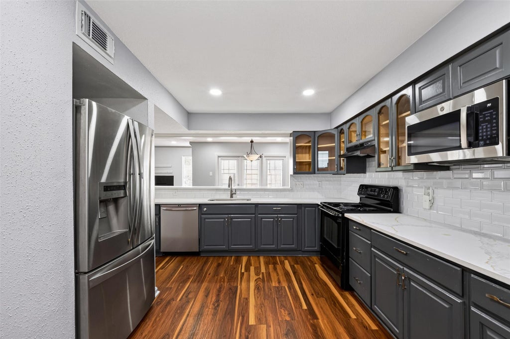 Photo of 7365 Antoine Drive, Houston, TX 77088 (MLS # 22365589)