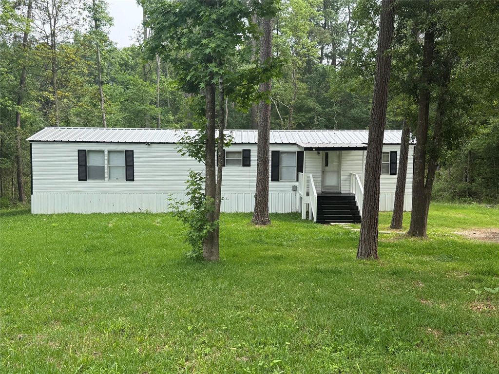 Photo of 24497 Clark Rd, Montgomery, TX 77316 (MLS # 60530693)