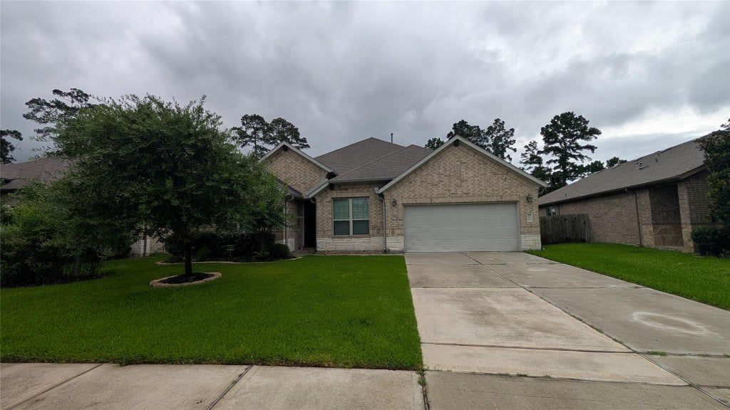 Photo of 8814 Vasco Da Gama Trace, Houston, TX 77044 (MLS # 22502660)