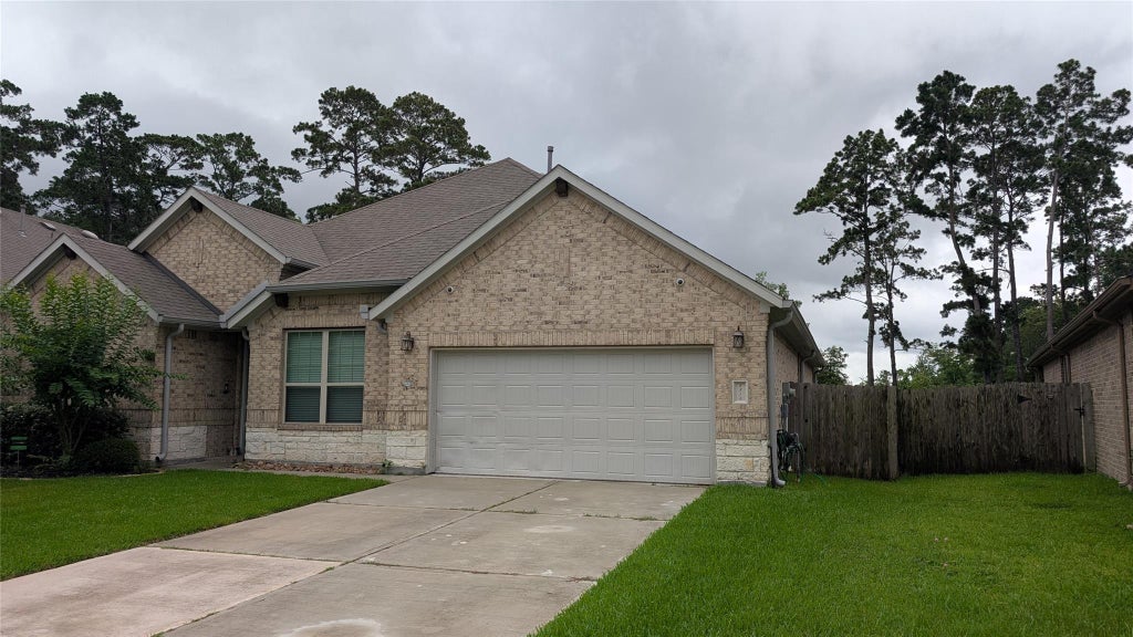 Photo of 8814 Vasco Da Gama Trace, Houston, TX 77044 (MLS # 22502660)