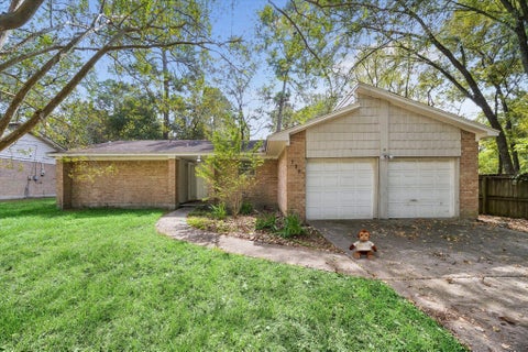 Photo of 130 Red Oak Lane, Conroe, TX 77304 (MLS # 70038881)