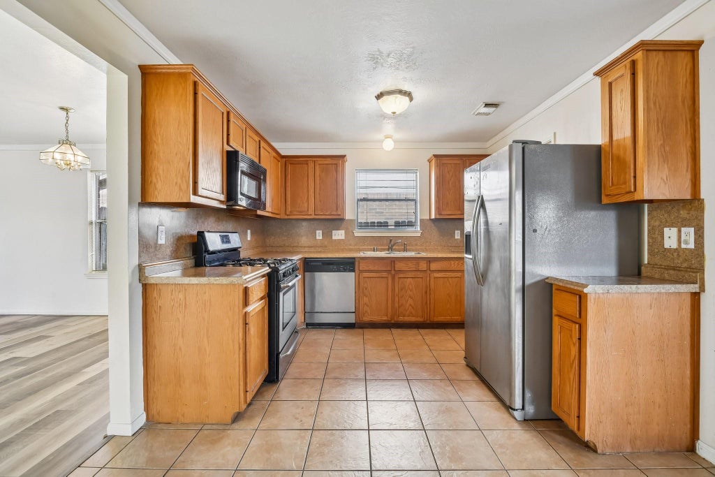 Photo of 12006 Thornburg Lane, Houston, TX 77067 (MLS # 48208467)