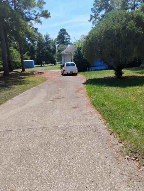 Photo of 11 Ross Mcbride Lane, Huntsville, TX 77340 (MLS # 54736946)