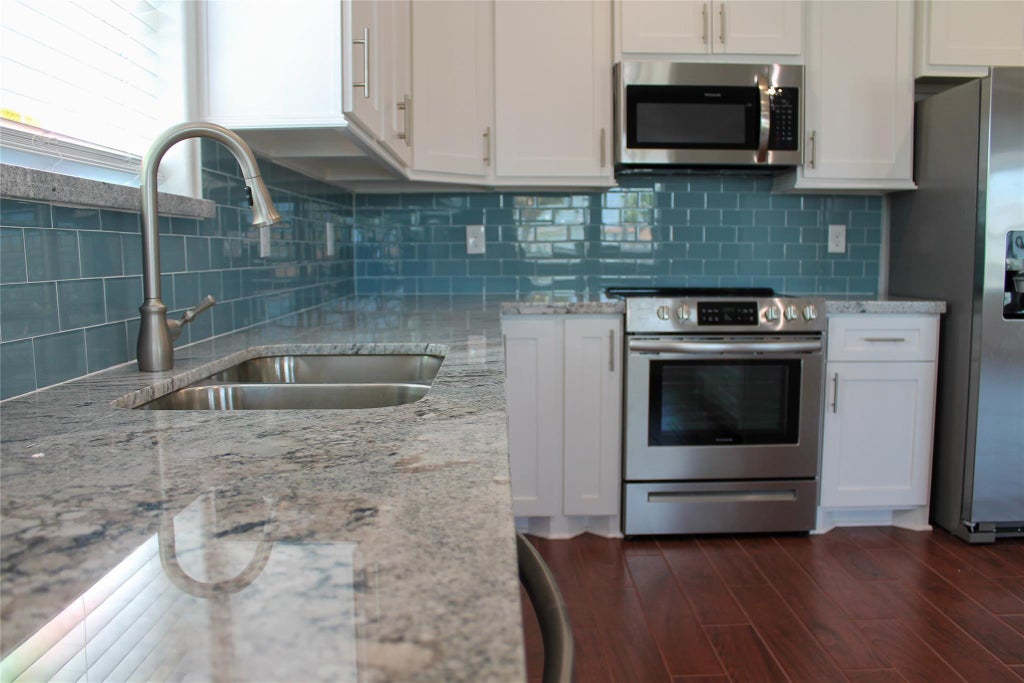 Photo of 9614 Teichman Road, Galveston, TX 77554 (MLS # 37966104)