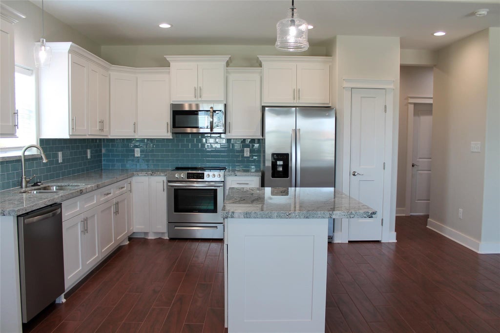 Photo of 9614 Teichman Road, Galveston, TX 77554 (MLS # 37966104)