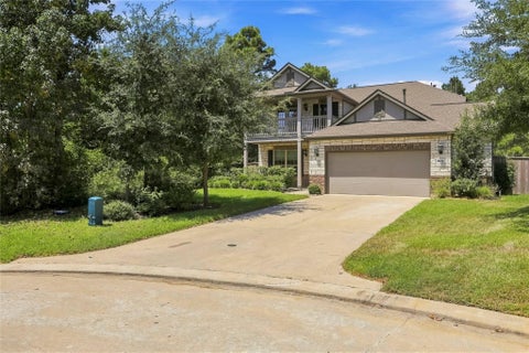 Photo of 309 Lochvale Peak Court, Montgomery, TX 77316 (MLS # 62931188)
