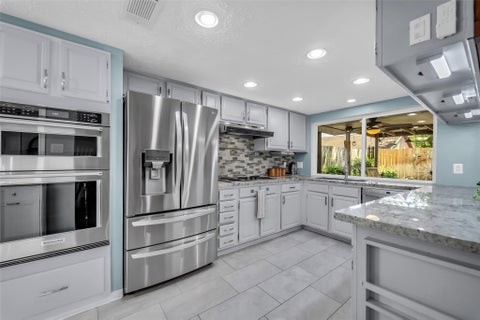 Photo of 16222 Green Shade Drive, Houston, TX 77090 (MLS # 20745919)