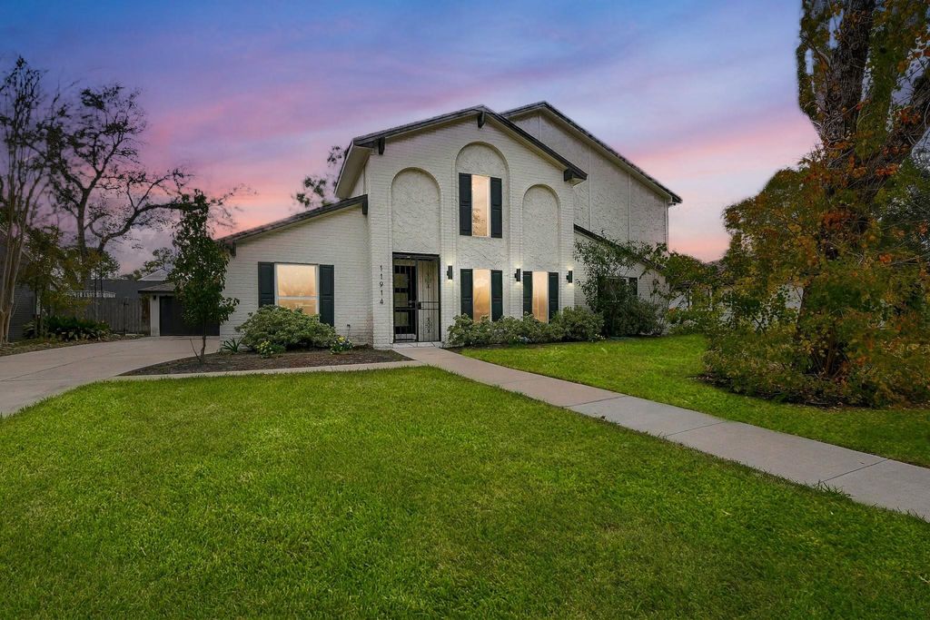 Photo of 11914 Riverview Drive, Houston, TX 77077 (MLS # 48366019)