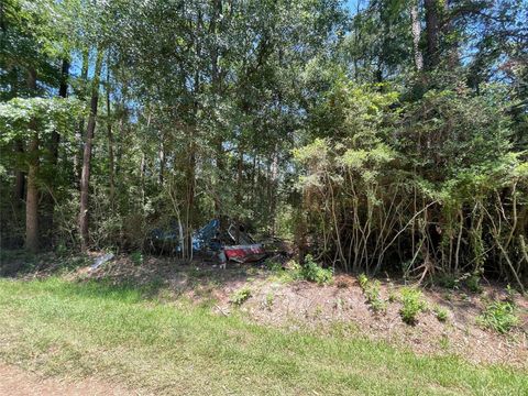 Photo of 0 County Road 3252, Cleveland, TX 77327 (MLS # 98991300)