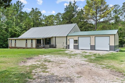 Photo of 9 Wood Forest Drive, New Waverly, TX 77358 (MLS # 22205294)