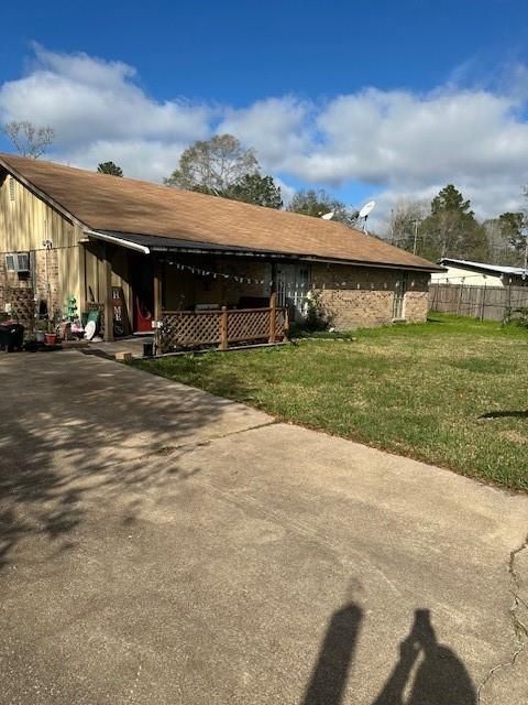 Photo of 157 County Road 3252, Cleveland, TX 77327 (MLS # 25865431)
