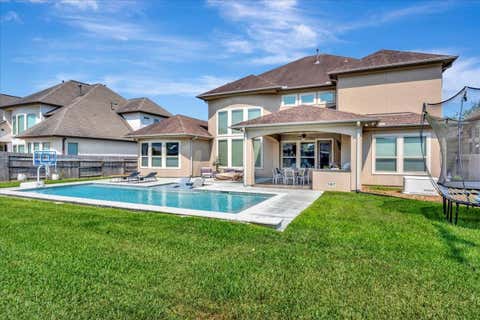 Photo of 1310 Tamina Pass Lane, Friendswood, TX 77546 (MLS # 68213779)