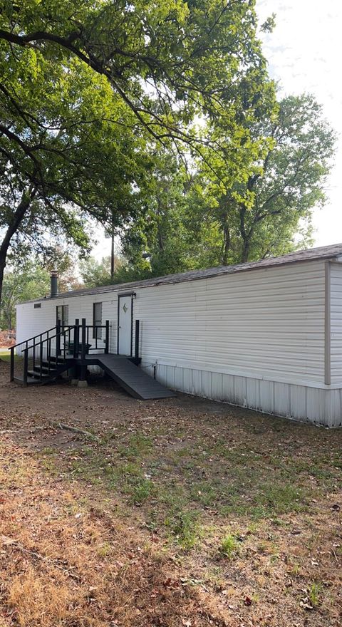 Photo of 213 Orange St St, Cleveland, TX 77327 (MLS # 90332872)