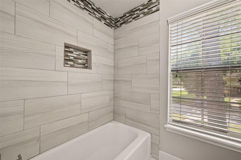 Tiny photo for 1102 Belaya Lane, Houston, TX 77090 (MLS # 97689761)