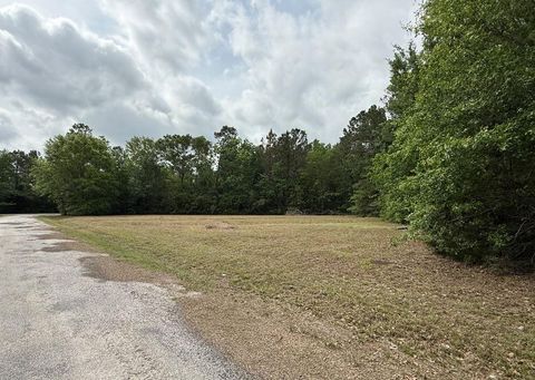 Photo of TBD W Fm 1374 Rd, Huntsville, TX 77340 (MLS # 81630114)