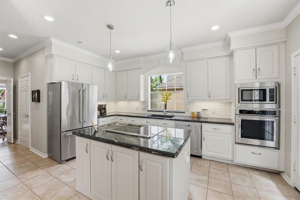 Photo of 4111 Windy Woods Court, Houston, TX 77345 (MLS # 63555832)