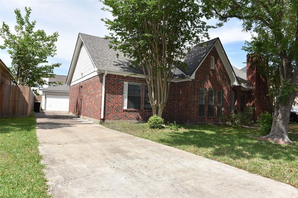 Photo of 12134 Ella Lee Lane, Houston, TX 77077 (MLS # 53880011)