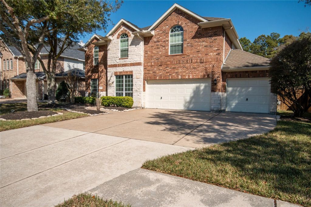 Photo of 14606 Wildwood Springs Lane, Houston, TX 77044 (MLS # 98816524)