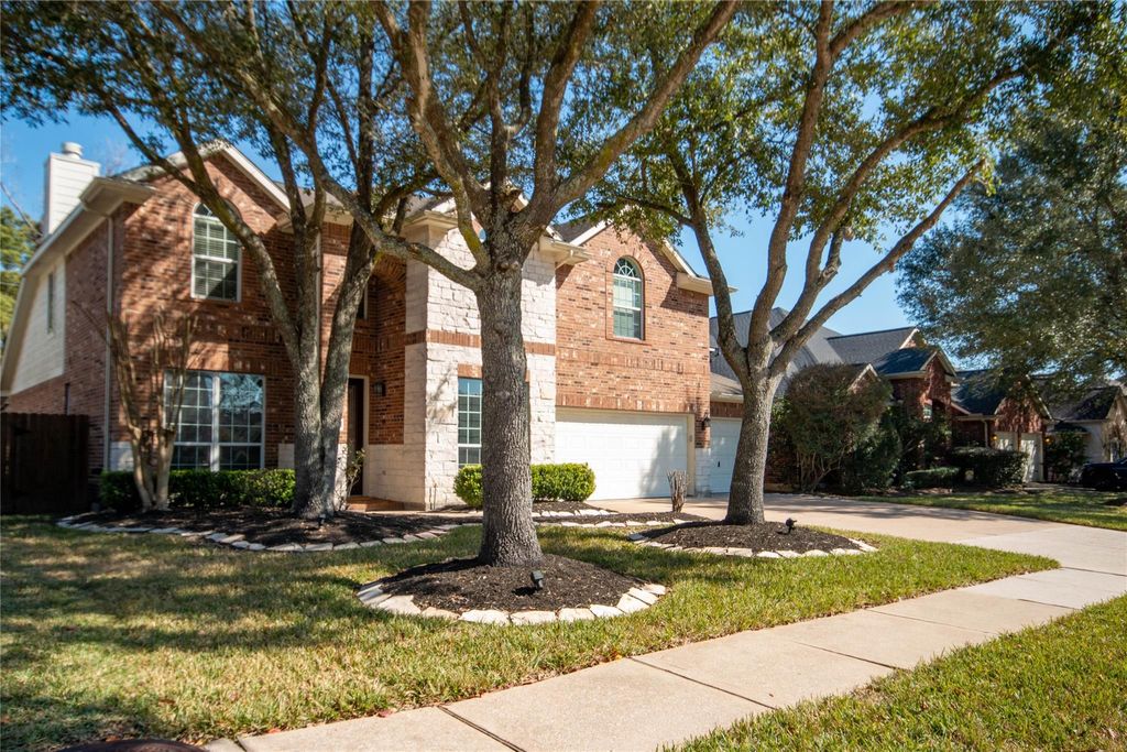 Photo of 14606 Wildwood Springs Lane, Houston, TX 77044 (MLS # 98816524)