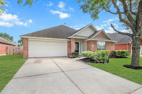 Photo of 9410 Lakeway View Lane, Humble, TX 77396 (MLS # 40634044)