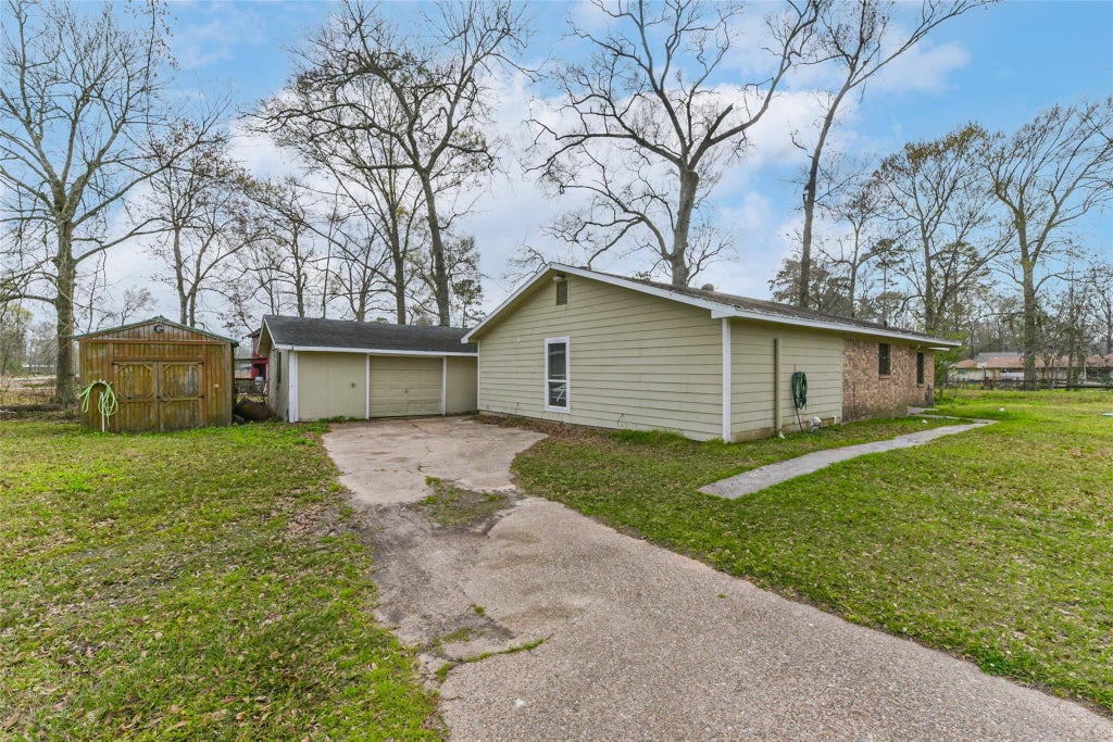 Photo of 26790 Burning Tree, New Caney, TX 77357 (MLS # 65781822)