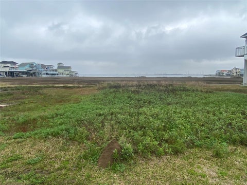 Photo of 22 Tiki Drive, Tiki Island, TX 77554 (MLS # 24883601)