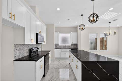 Photo of 5906 Saint Augustine Street #F, Houston, TX 77021 (MLS # 21727364)