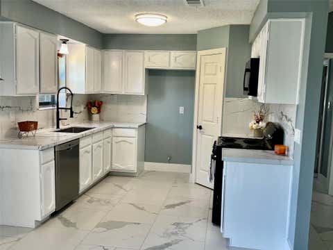 Photo of 7903 W Waxleaf Dr Drive W, Humble, TX 77338 (MLS # 31309775)